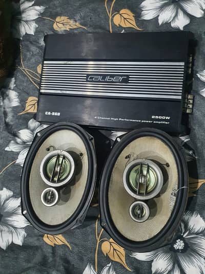 Kenwood Sound System with Caliber Amplifier