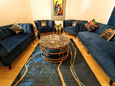 7 Seater Branded Sofa Set for sale with center table, rug and curtain