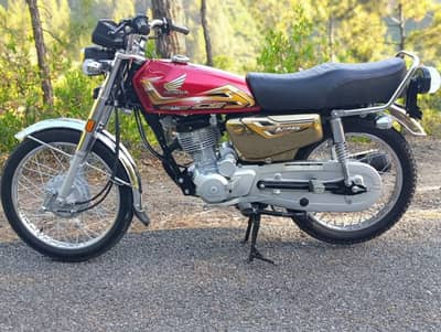 Honda 125 self start golden