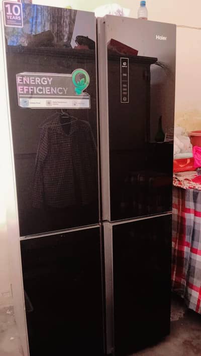 double door refrigerator black shine color new condition price 1 lac 3