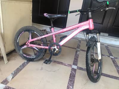 Bicycle pink coloured 10 - 15 yes