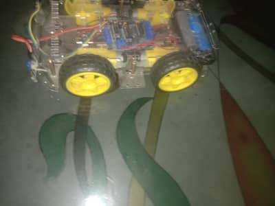 It's a car which have a specific path and follows black colour, a very