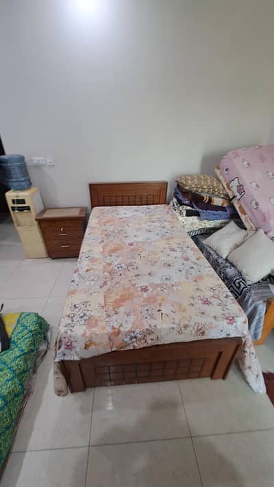 single bed with side table best for hostels
