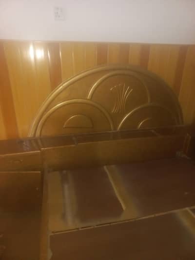 Double bed without mattress.