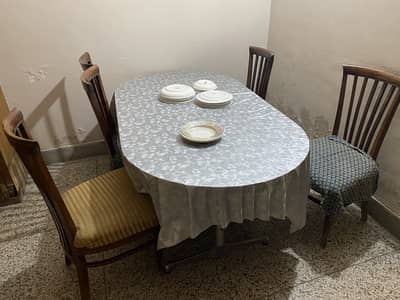 Used dining table with 6 chairs