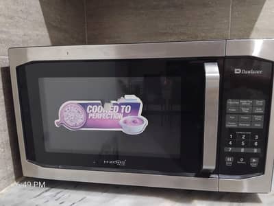 dawlance microwave for sale used but just 2 months  new brand