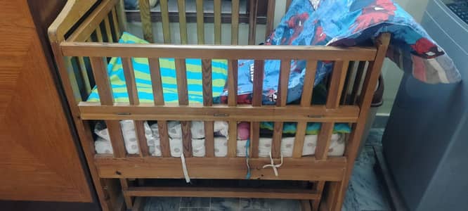 baby cot with mattresses