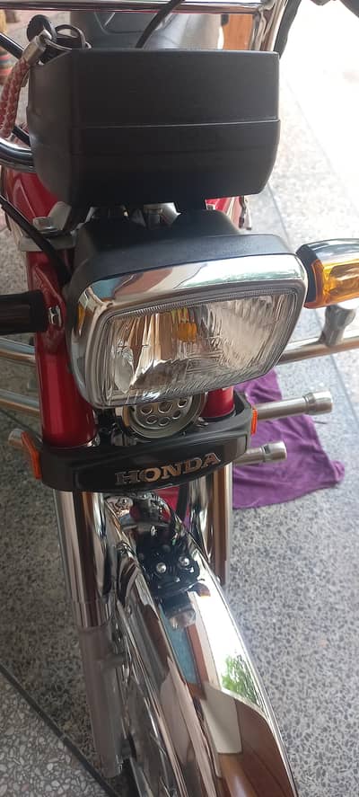 Honda cd 70 2023 model 6000  km used number nahi lga all new new bike