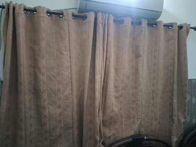 New Curtain and slightly sued curtain almost new,