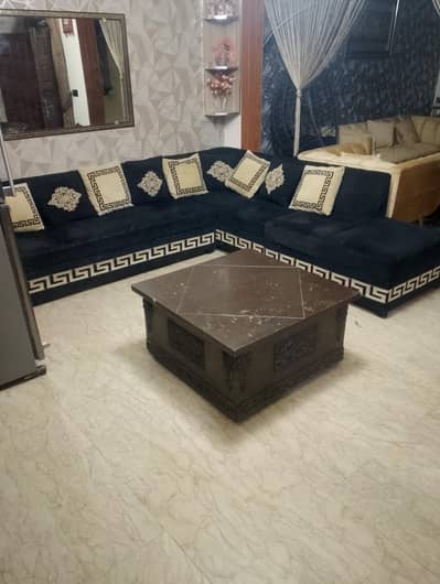 L Shape 7 Seater sofa with 10 Cushions with Center table.