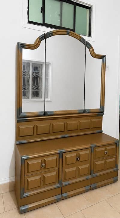 Queen Size Bed, Dressing table, three door cupboard.