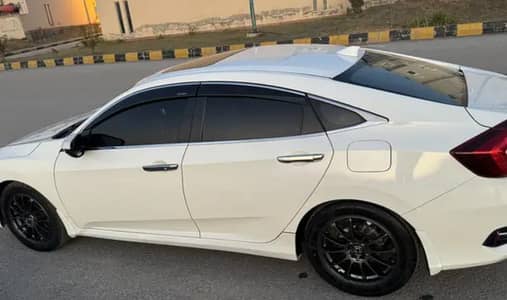 Honda Civic EXi 2024