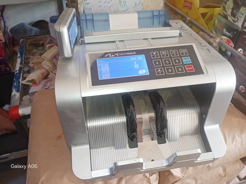Note Counting and checking machine 4