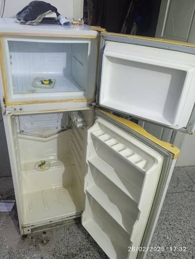 12 sqf refrigerator for sale my in working condition 8/10 .