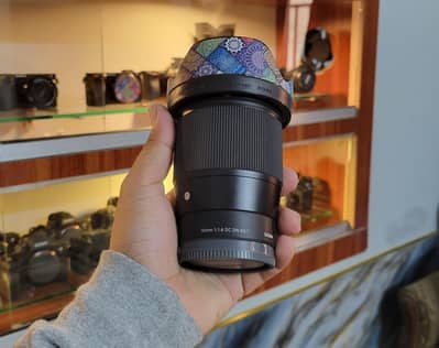 Sigma 16mm f1.4 dc dn (10/10++) Sony E. Mount