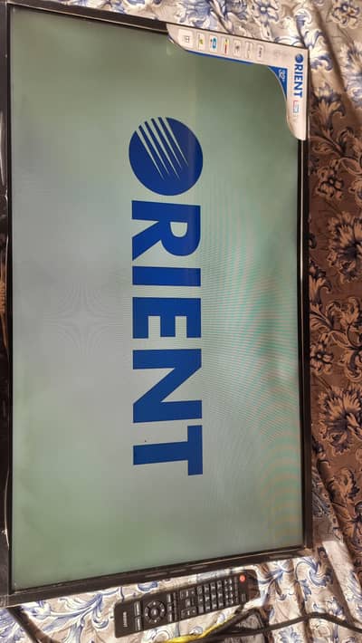 32" Orient LCD TV with Remote & Wall Bracket – Good Condition