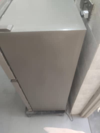 SELLING REFRIGERATOR AND LOOKING B