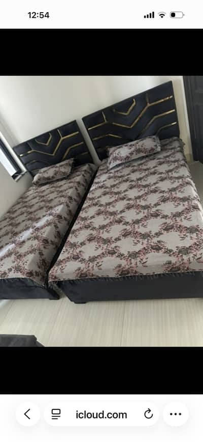 2 single bed with one Side table