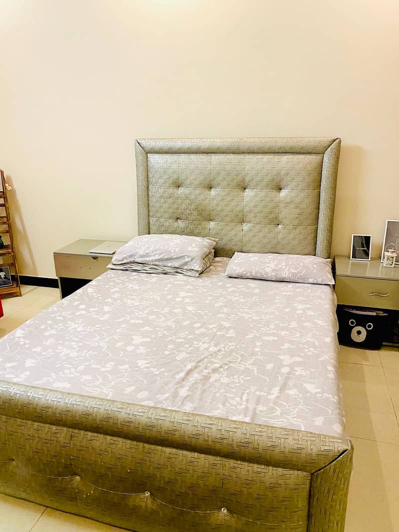 Wooden queen bed 1
