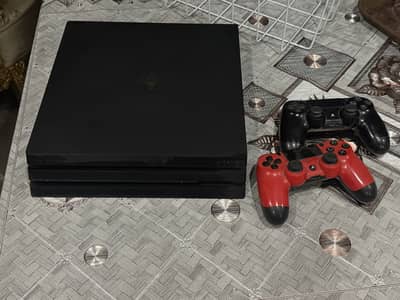 play station 4 pro 10/10 condition with 2 controllers
