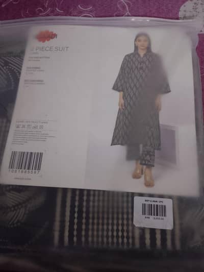 new two peice suit khaadi shirt and trouser printed in black