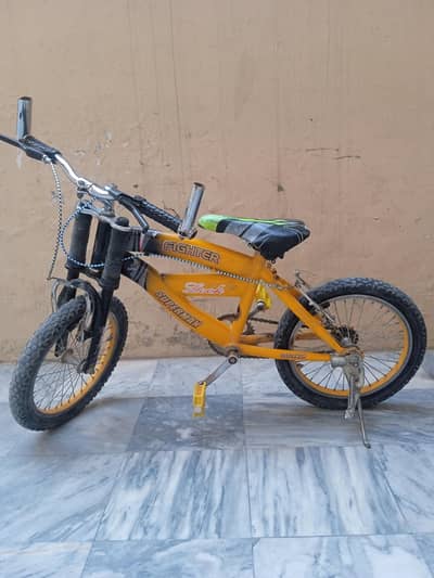 Used bicycle for kids. Back tyre need to be changed.
