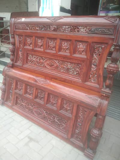 It is in solid wood and compleate set