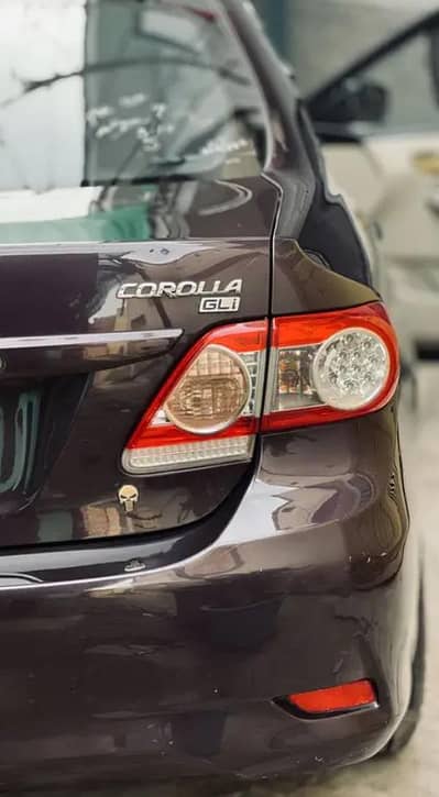 Toyota Corolla Gli 2012 Almost Genuine Lahore Number ( 0308-7144-116 )