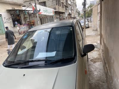 Daihatsu Mira 2003