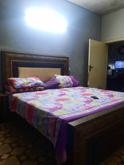 Queen size bed with drawers and dressing table