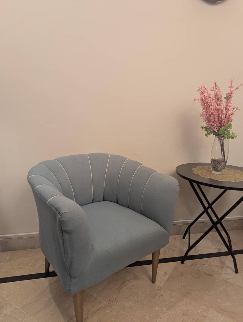 2 sofa chairs with table 2