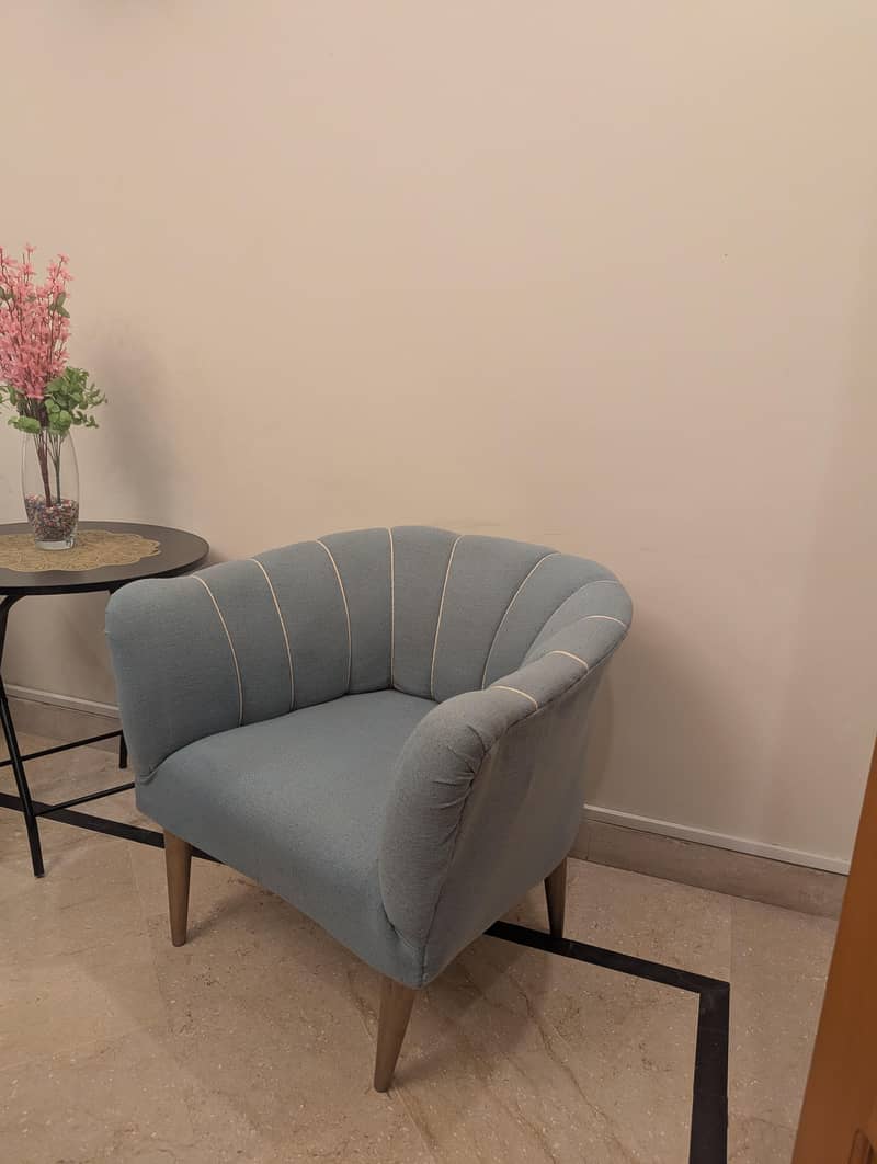 2 sofa chairs with table 3