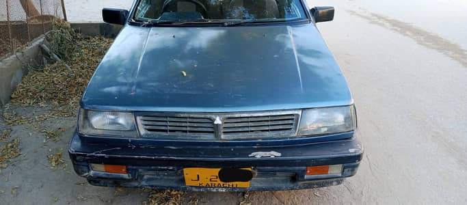 japanese Mitsubishi lancer 1987 with LPG smooth drive 03092092662