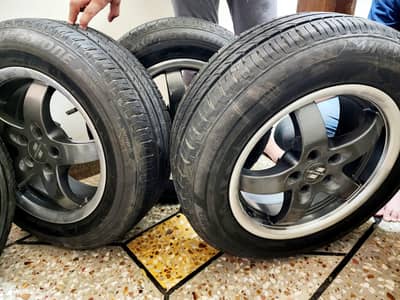 15 inches Rim & Tyres like new