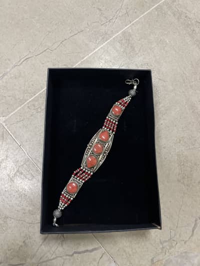 Red coral stone infused in silver bracelet