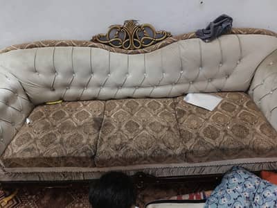 one big sofa and other 2 sofas