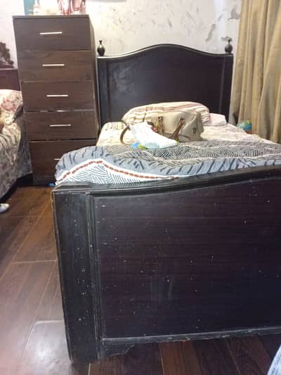 Single wooden bed