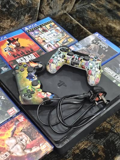 ps4 used slim 500 gb with 2 controllers