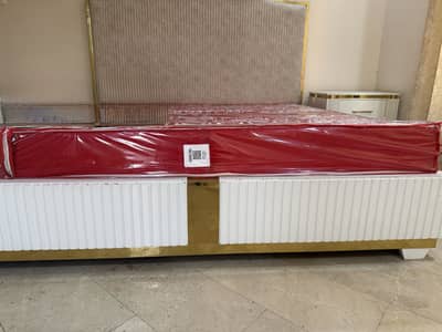 King Size Bed alongwith two side tables