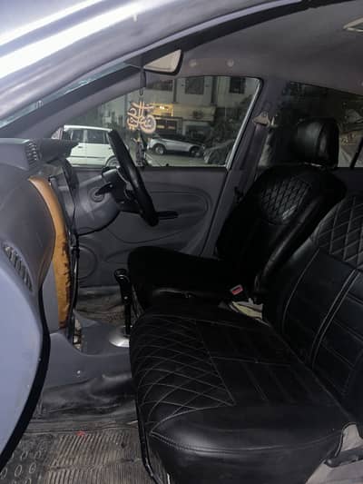 Daihatsu Mira 2004