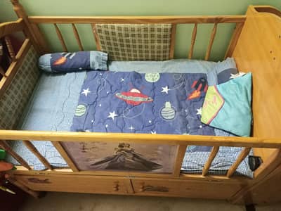 baby wooden cot with complete bed set