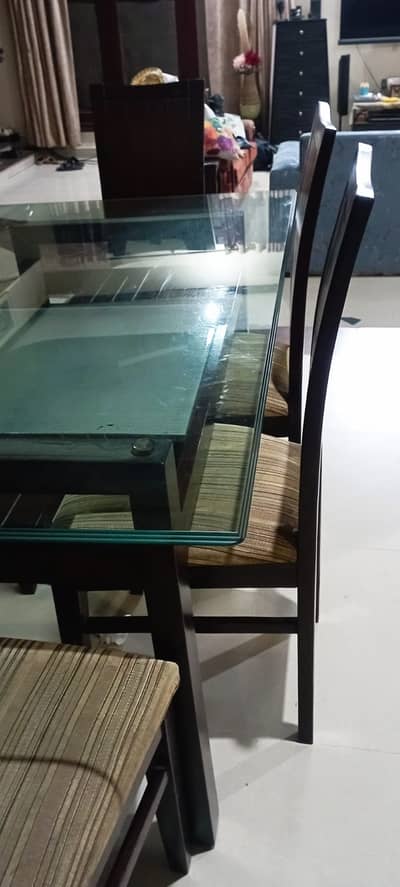 6 seater glass dining table available