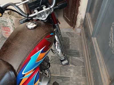 Honda CD 70 red colour 2000 kilometres chala huwa