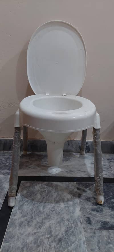 Portable commode chair for patients