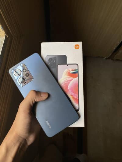 Redmi Note 12 +box and charger.