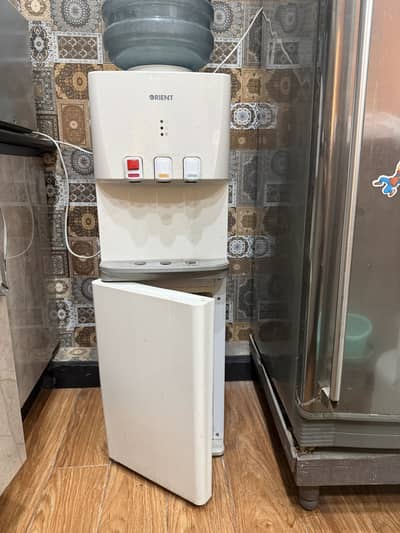 Water dispenser with functional mini fridge