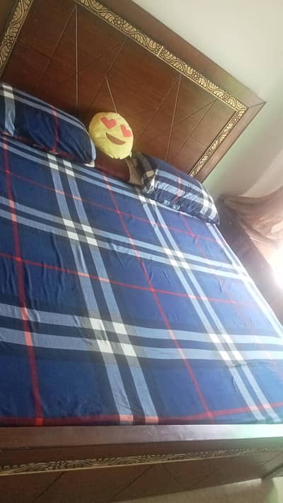 double bed with side tables and Almirah