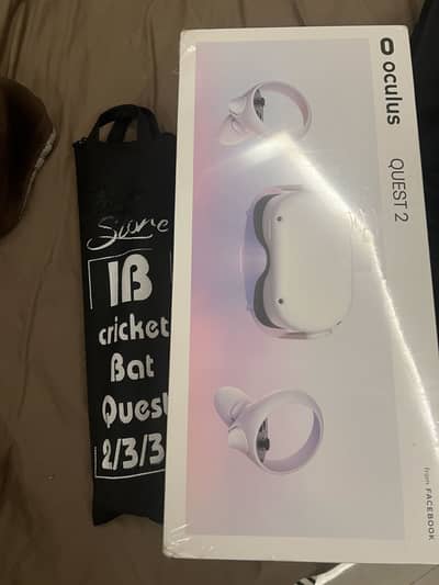 Meta quest 2  device with cricket bat