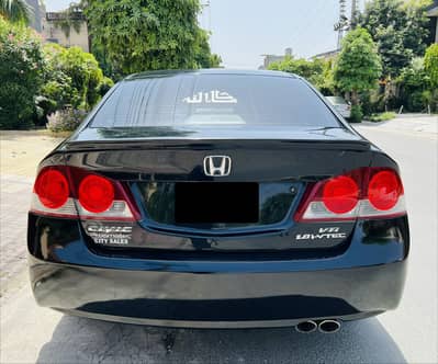 Honda civic vti promatic 1.8 TOTAL GENIUNE