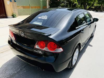 Honda civic vti promatic 1.8 TOTAL GENIUNE